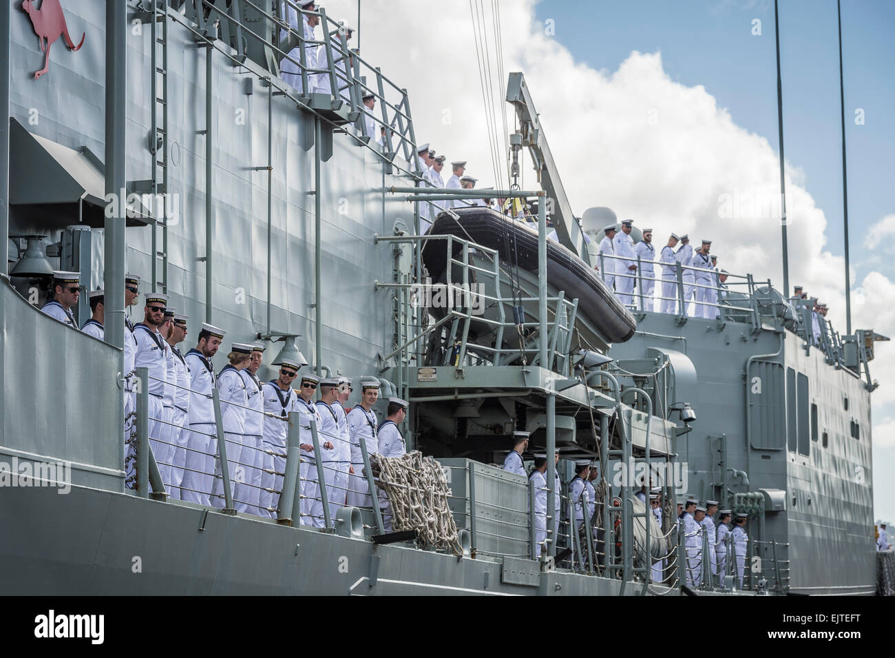 Sydney, AUSTRALIA - April 01, 2015: Officers and crew line the decks of frigate HMAS Newcastle at Garden Island Naval Base, Sydney. Credit:  MediaServicesAP/Alamy Live News Stock Photo
