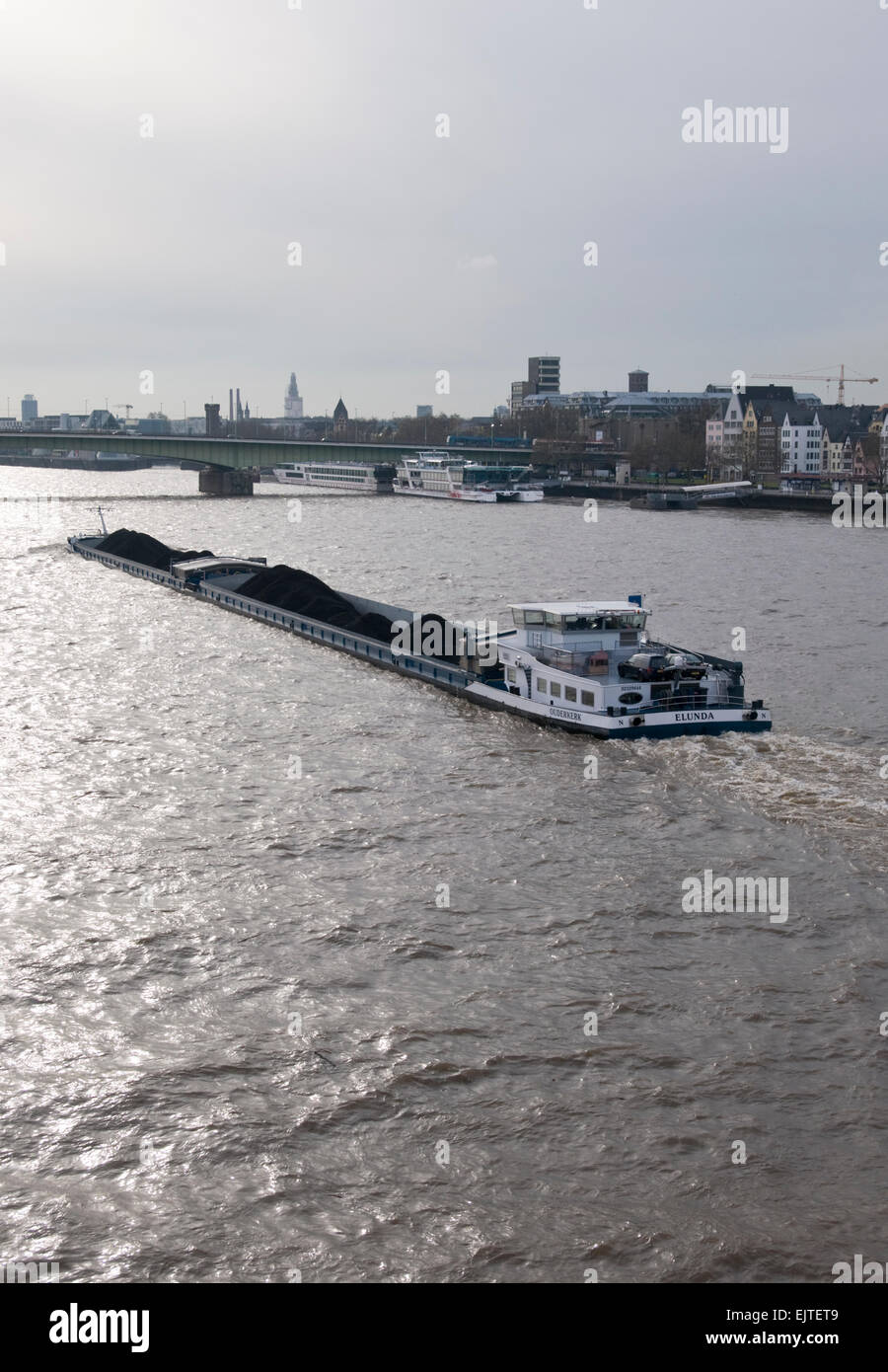 German Coal Barge travels down River Rhein Stock Photo