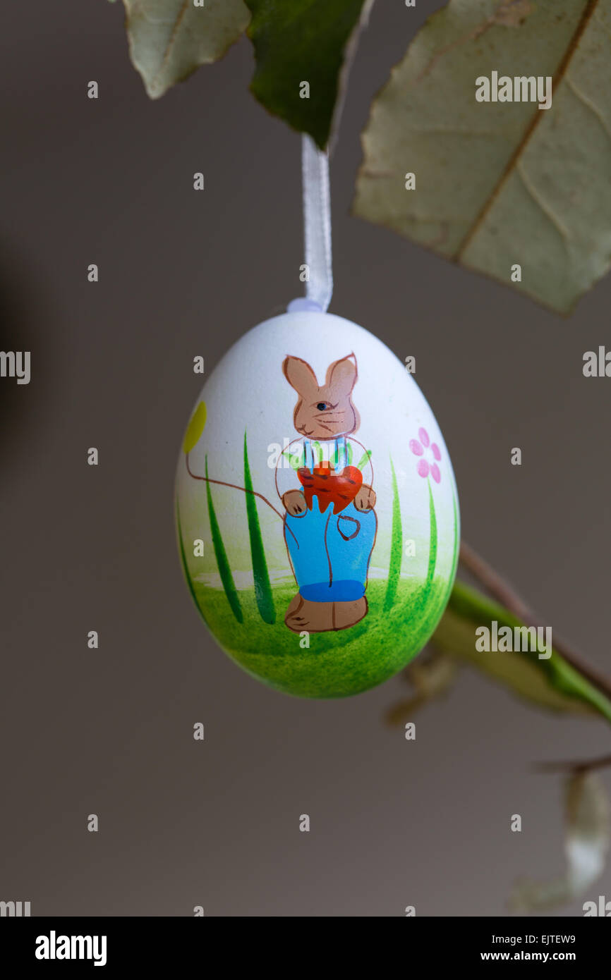Easter eggs hanging on branches Stock Photo