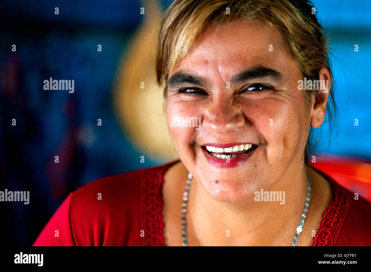 Woman at market stall, near bus station, Encarnacion, Paraguay Stock Photo