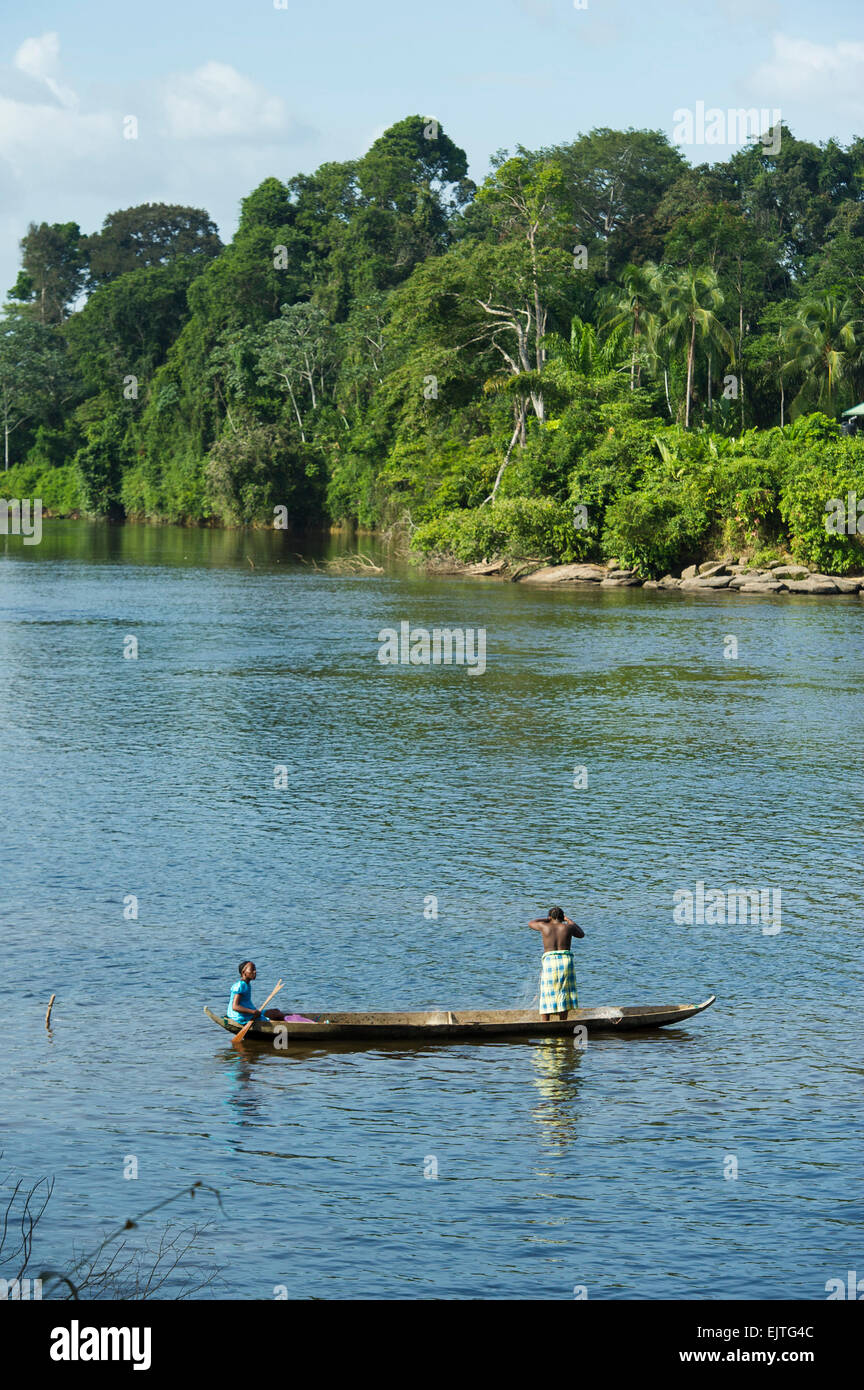 Maroon women fishing on the Upper Suriname River, Suriname Stock Photo