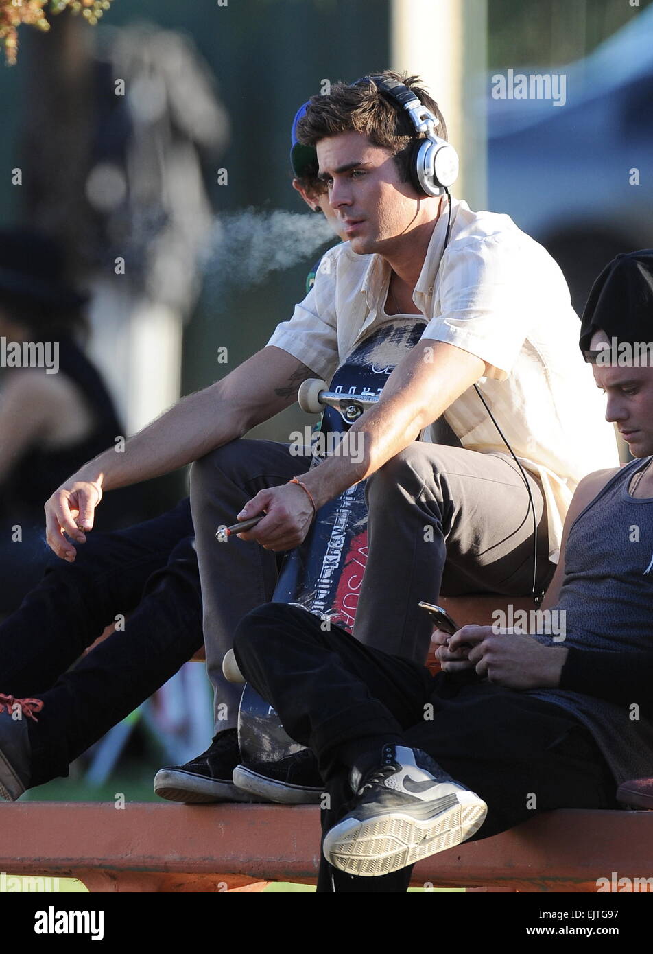 Actor Zac Efron filming a scene for his new movie 'We Are Your Friends'. In  the scene he is seen smoking a fake marijuana joint and acting out a drug  deal in