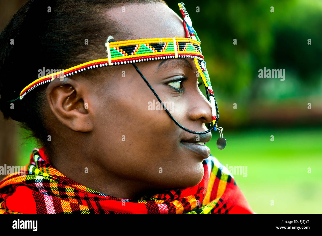 Young Kenyan woman in Maasai costume, Nairobi Stock Photo