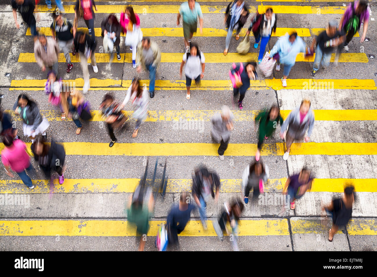 Hong Kong, Hong Kong SAR -November 13, 2014: Crowded pedestrian crossing during rush hour in Hong Kong. Stock Photo