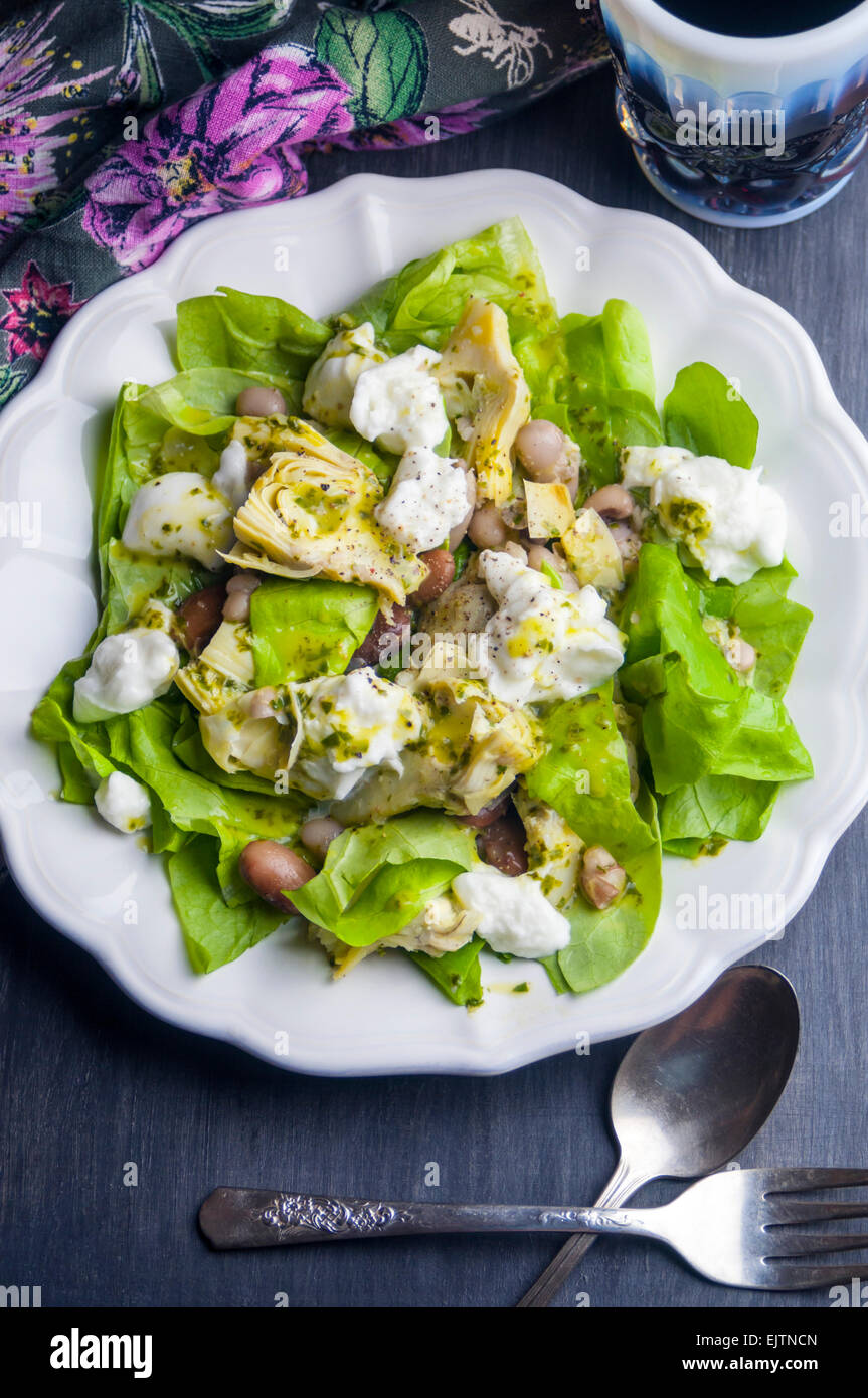 Artichoke Bean Salad with Burrata and Lemon Basil Vinaigrette Stock