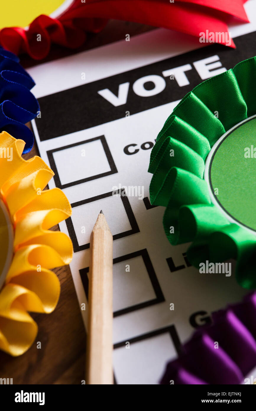 Selection Of Political Rossettes On Ballot Paper For Political Election Stock Photo