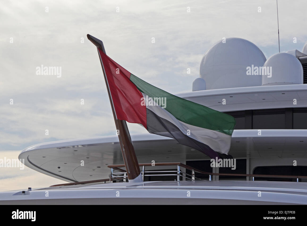 Flag of United Arab Emirates flying at stern of superyacht, Azzam Stock Photo