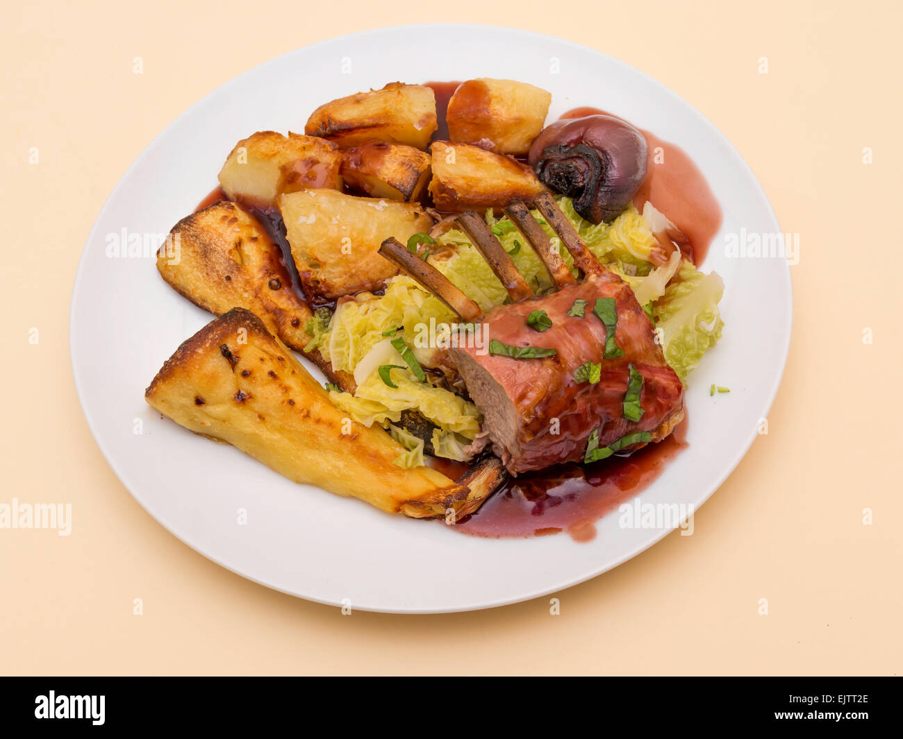English dinner meal roast rack of lamb with roast potatoes parsnips