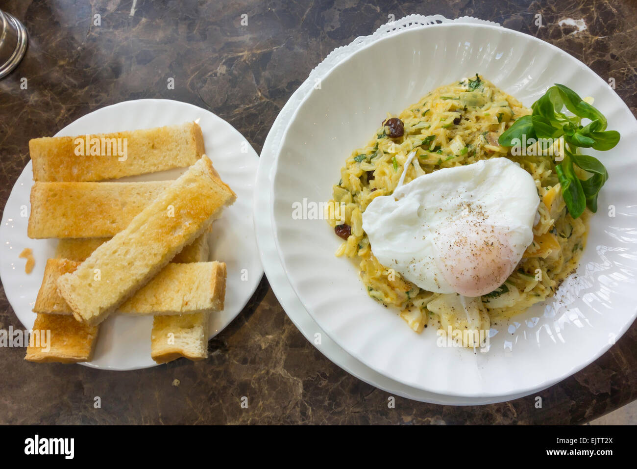 Kedgeree a breakfast dish that originated in India curried rice smoked