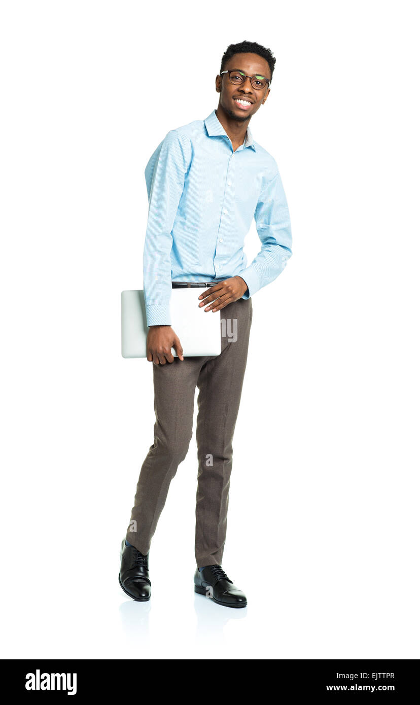 Happy african american college student with laptop standing on white background Stock Photo