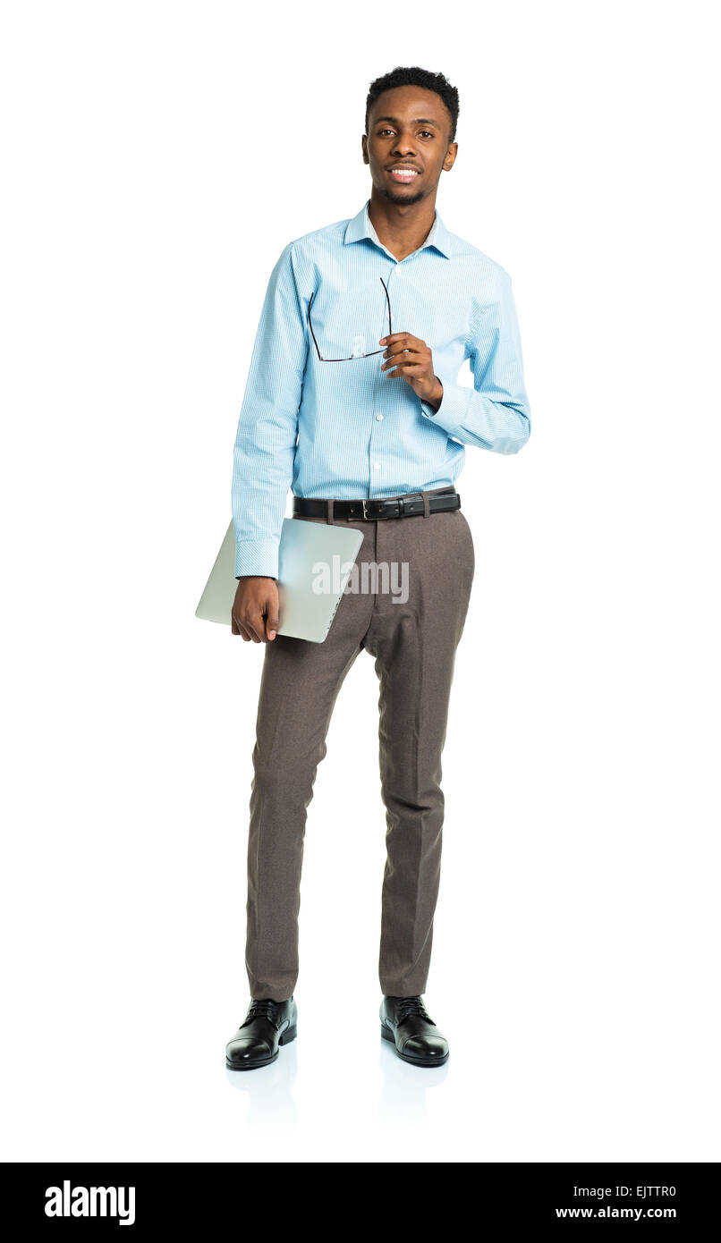 Happy african american college student with laptop standing on white background Stock Photo