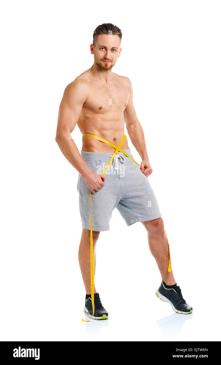 Sport man with measuring tape on the white background Stock Photo