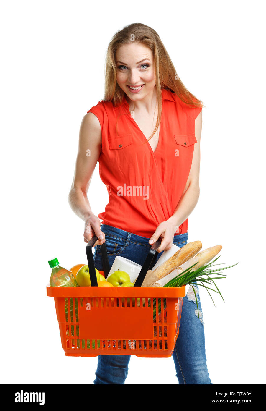 Happy young woman holding a basket full of healthy food. Shopping Stock ...
