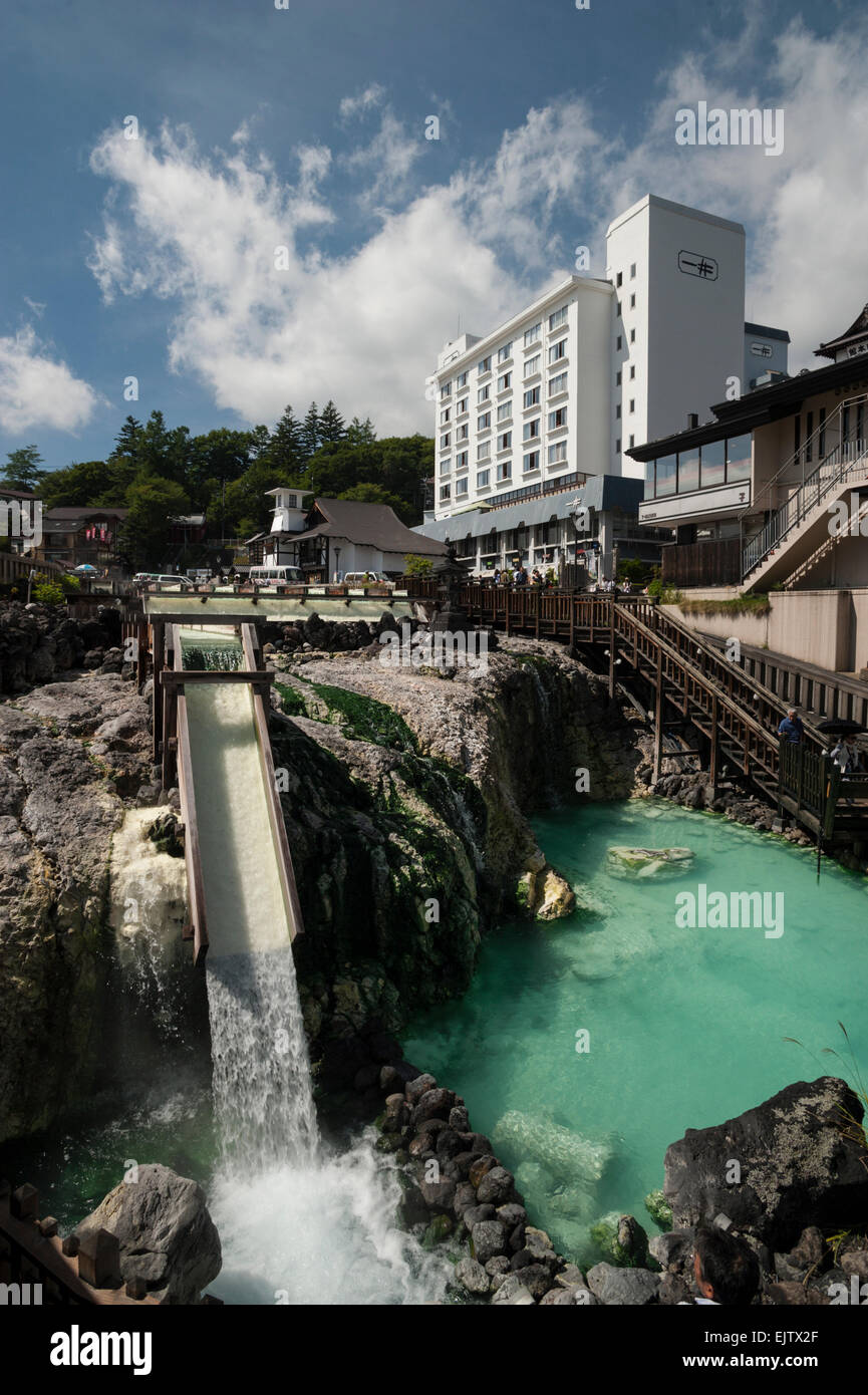 Hot springs (onsen) water flowing from the central Yubatake plaza at Kusatsu Onsen, Gunma Prefecture, Japan. Stock Photo