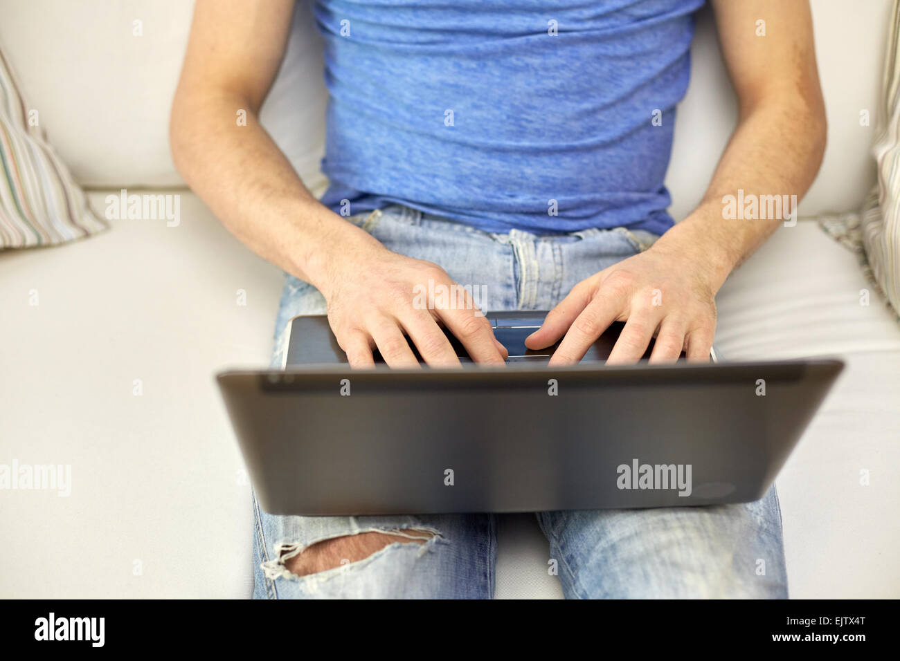 Closeup young man hands typing hi-res stock photography and images - Alamy