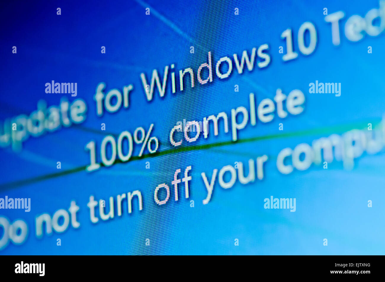 Installing Windows 10 Technical Preview, a public beta release. Stock Photo