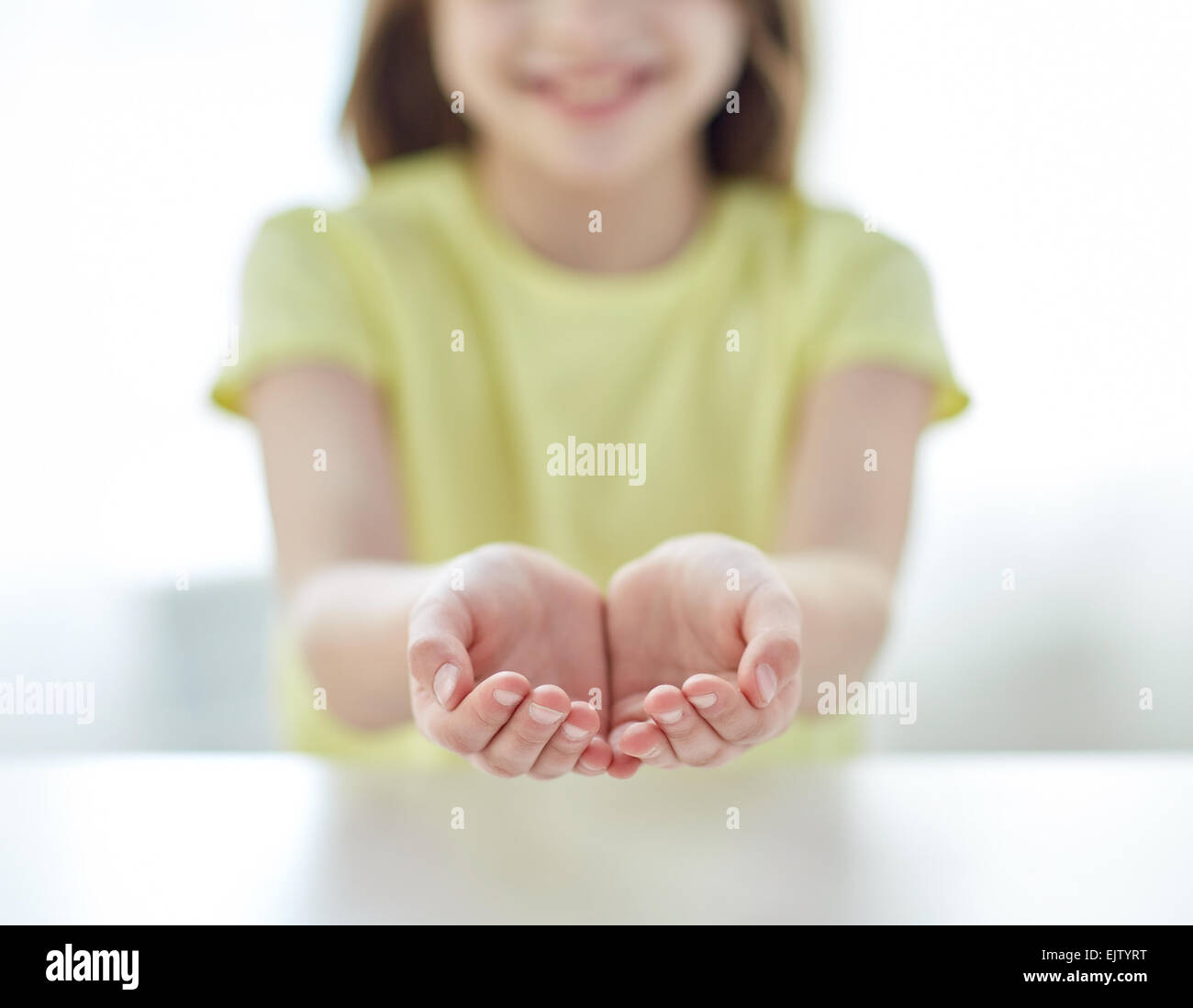 close up of child cupped hands Stock Photo