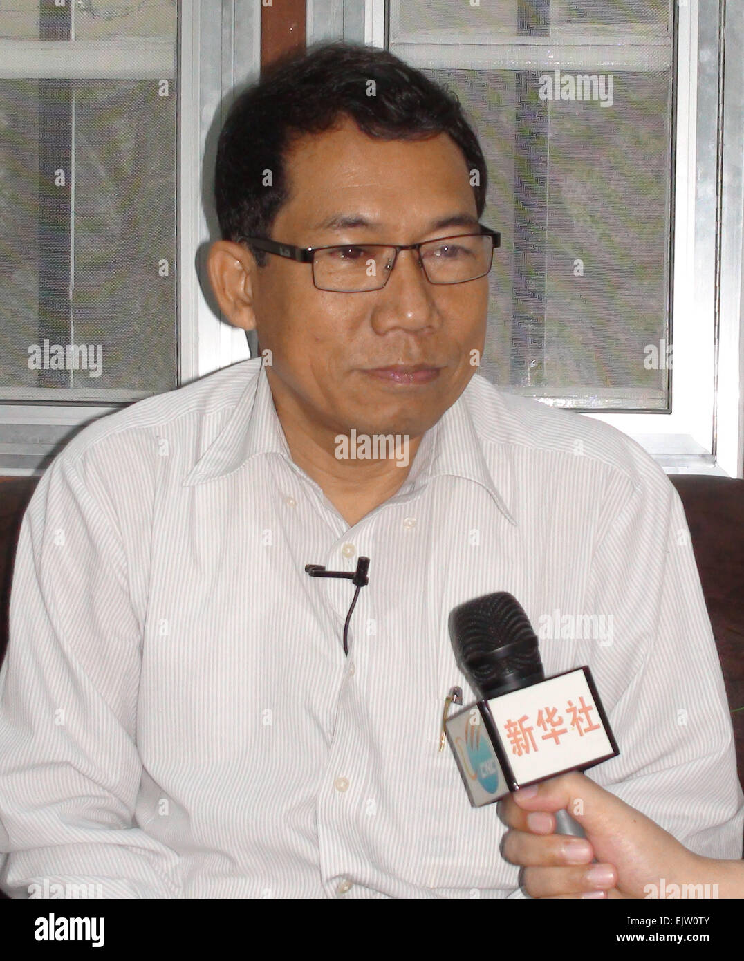 Yangon, Myanmar. 1st Apr, 2015. Dr Aye Muang, parliament member of the Upper House and chairman of Arakan National Party (ANP), receives an interview with Xinhua in Yangon, Myanmar, on April 1, 2015. Dr Aye Muang said on Wednesday that China's advocation of the concept of 'Belt and Road' initiative is a measure which will benefit neighboring countries and bring development to the region as well. © Ko Thaung/Xinhua/Alamy Live News Stock Photo