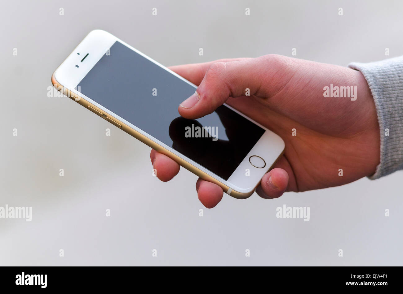 Person Holding Apple Iphone 6 Smartphone Stock Photo