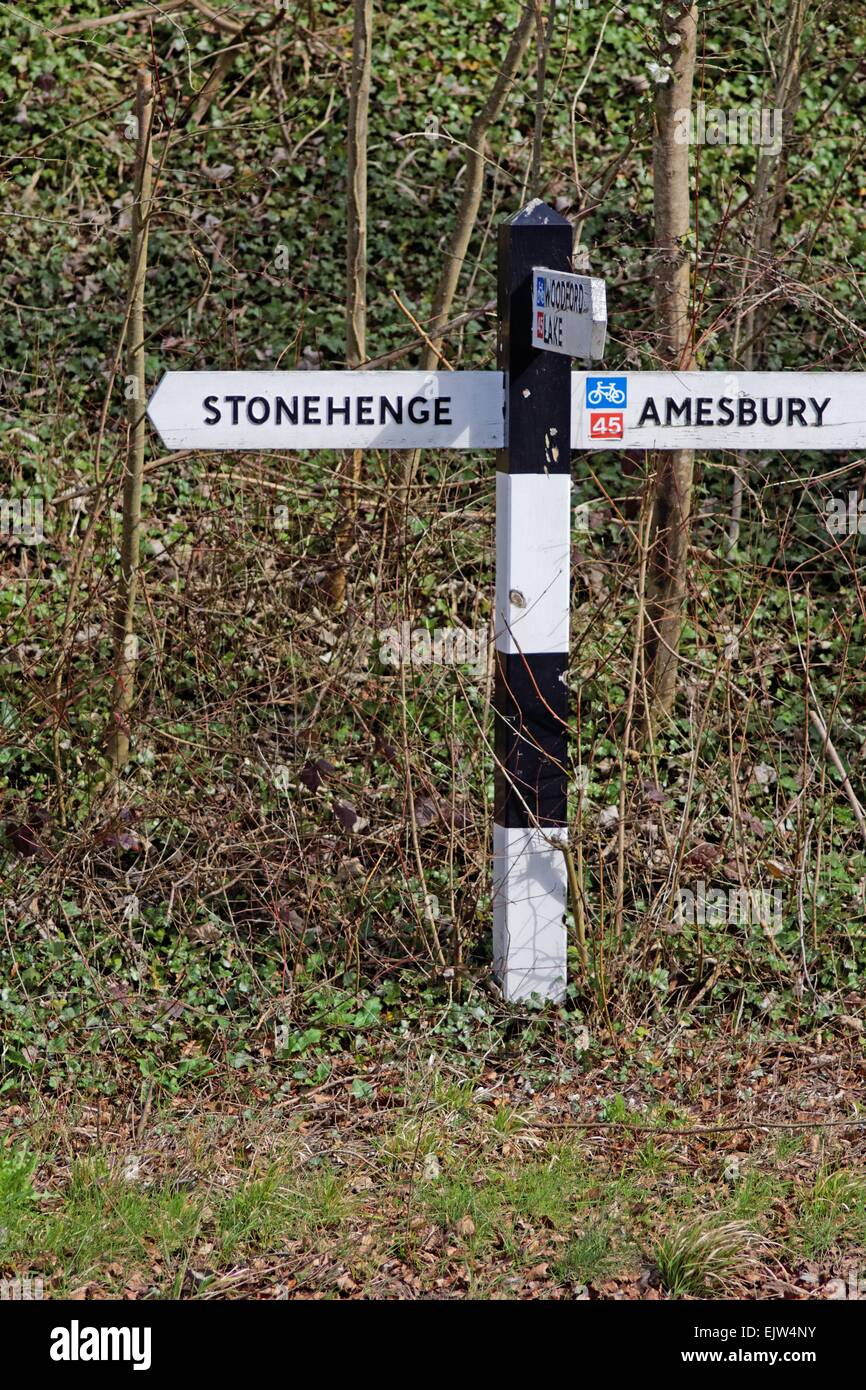 Three way road sign depicting way to Stonehenge Amesbury Wiltshire