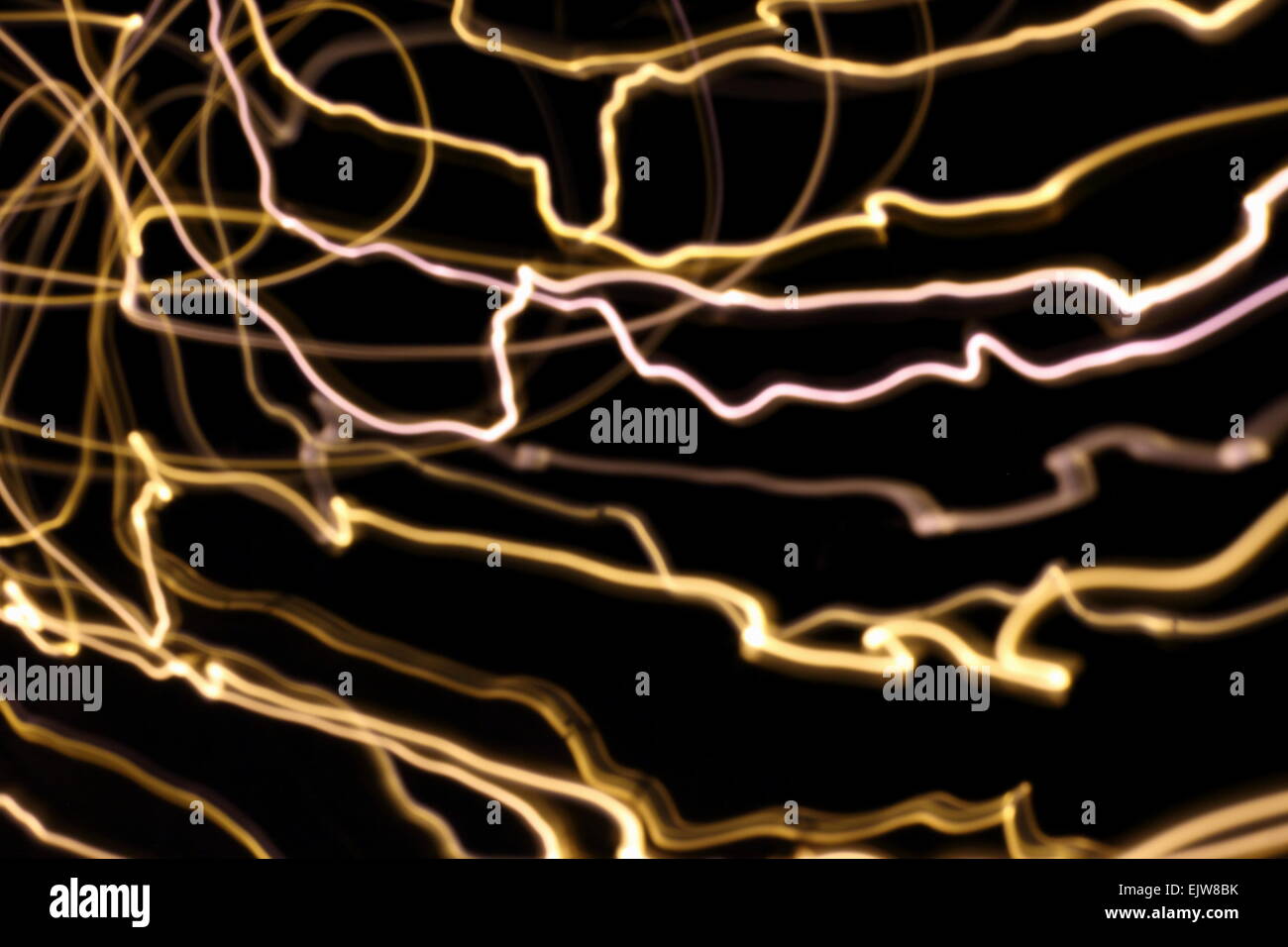 Abstract blurred power light lines on dark background, soft focus Stock Photo
