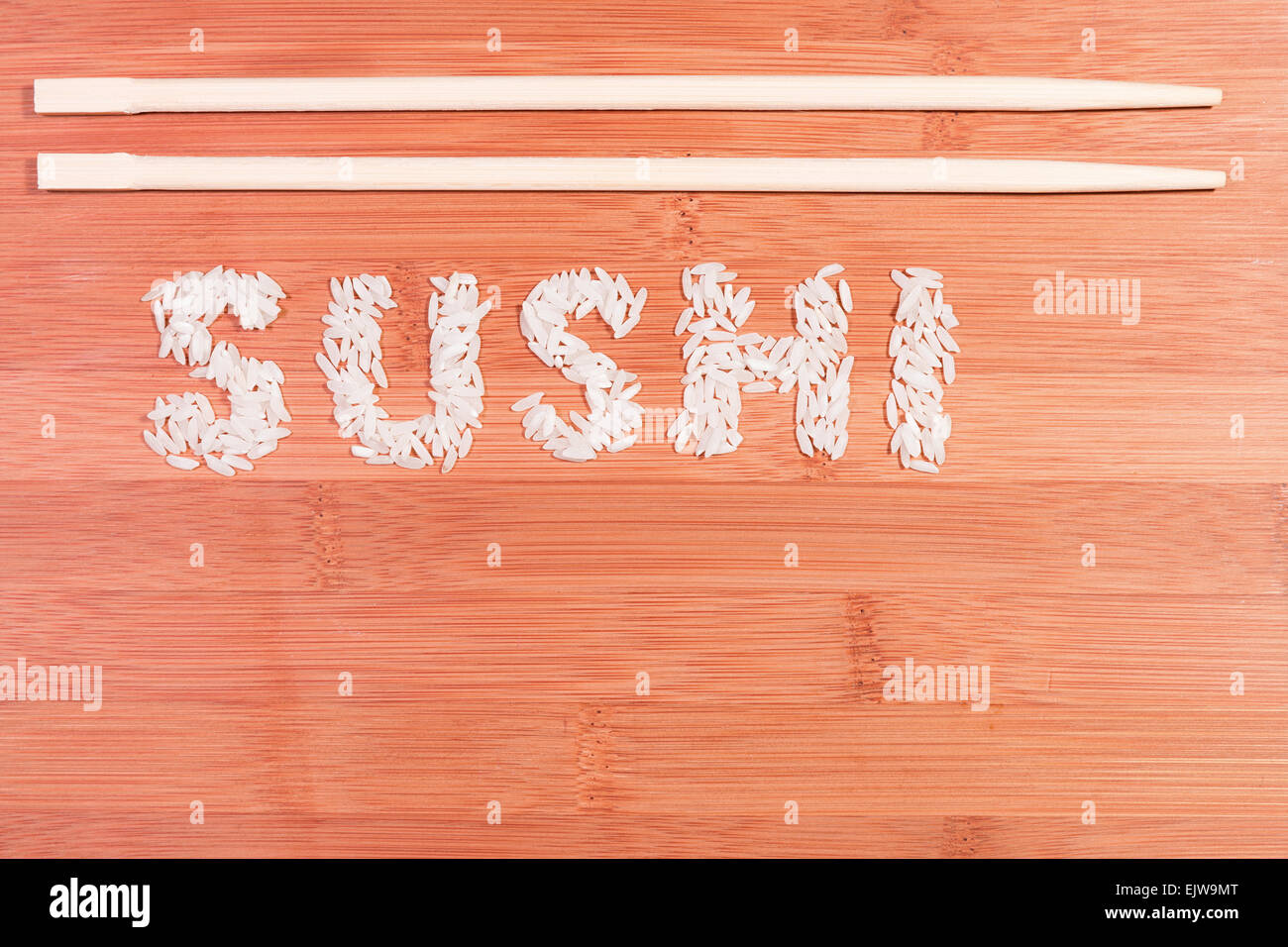 Written sushi made with rice Stock Photo - Alamy
