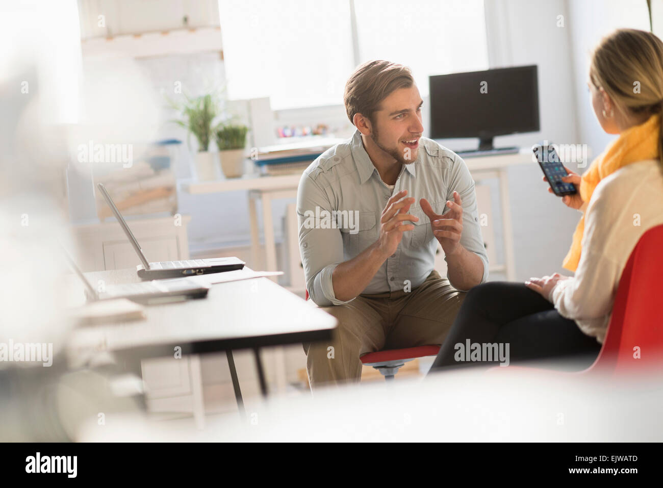 Seated woman in office meeting hi-res stock photography and images - Alamy