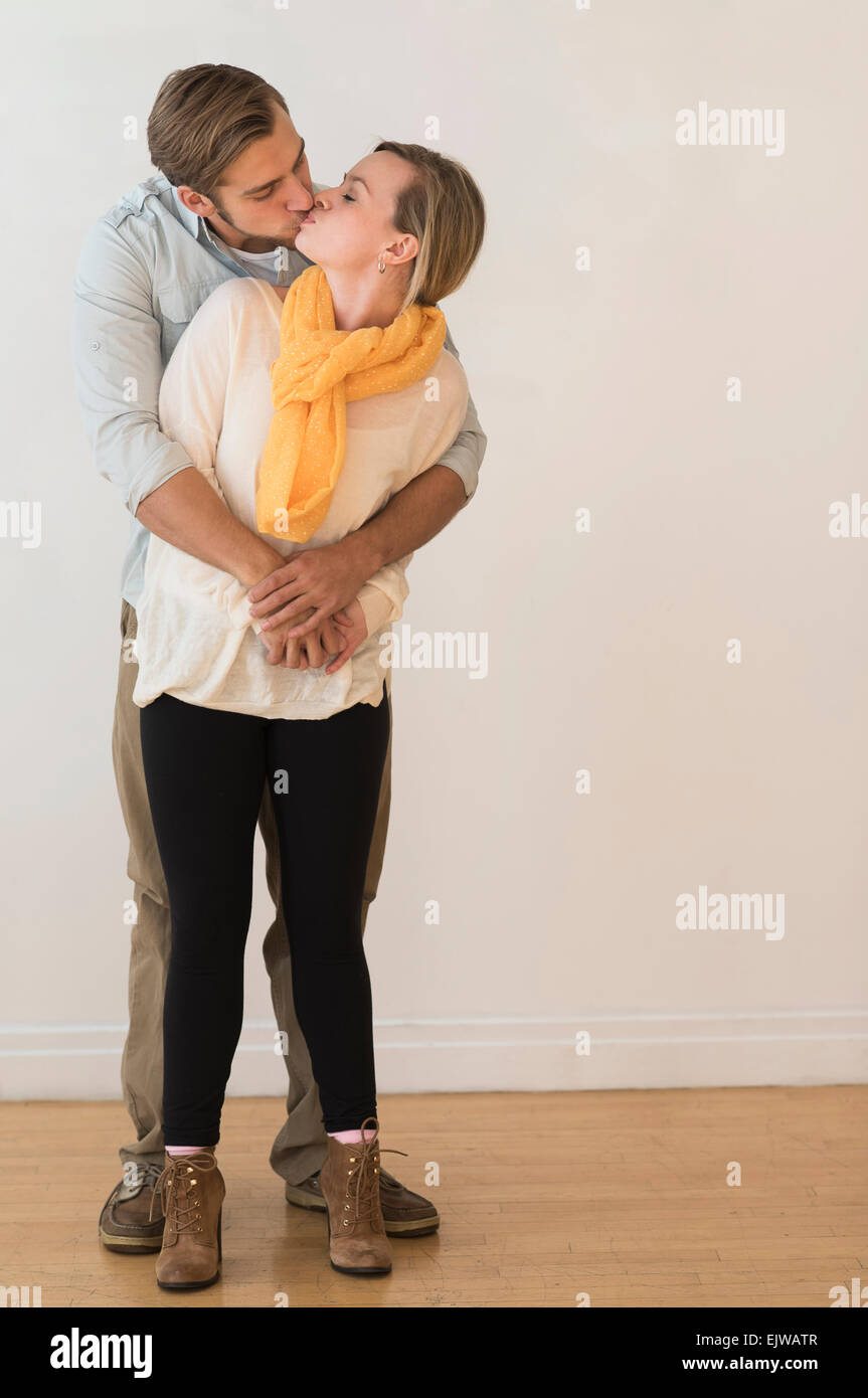 Young couple embracing and kissing Stock Photo