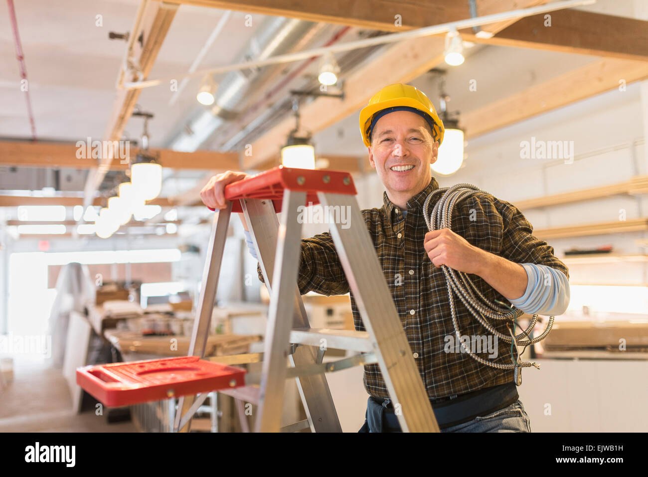 Portrait of electrician in hardhat Stock Photo