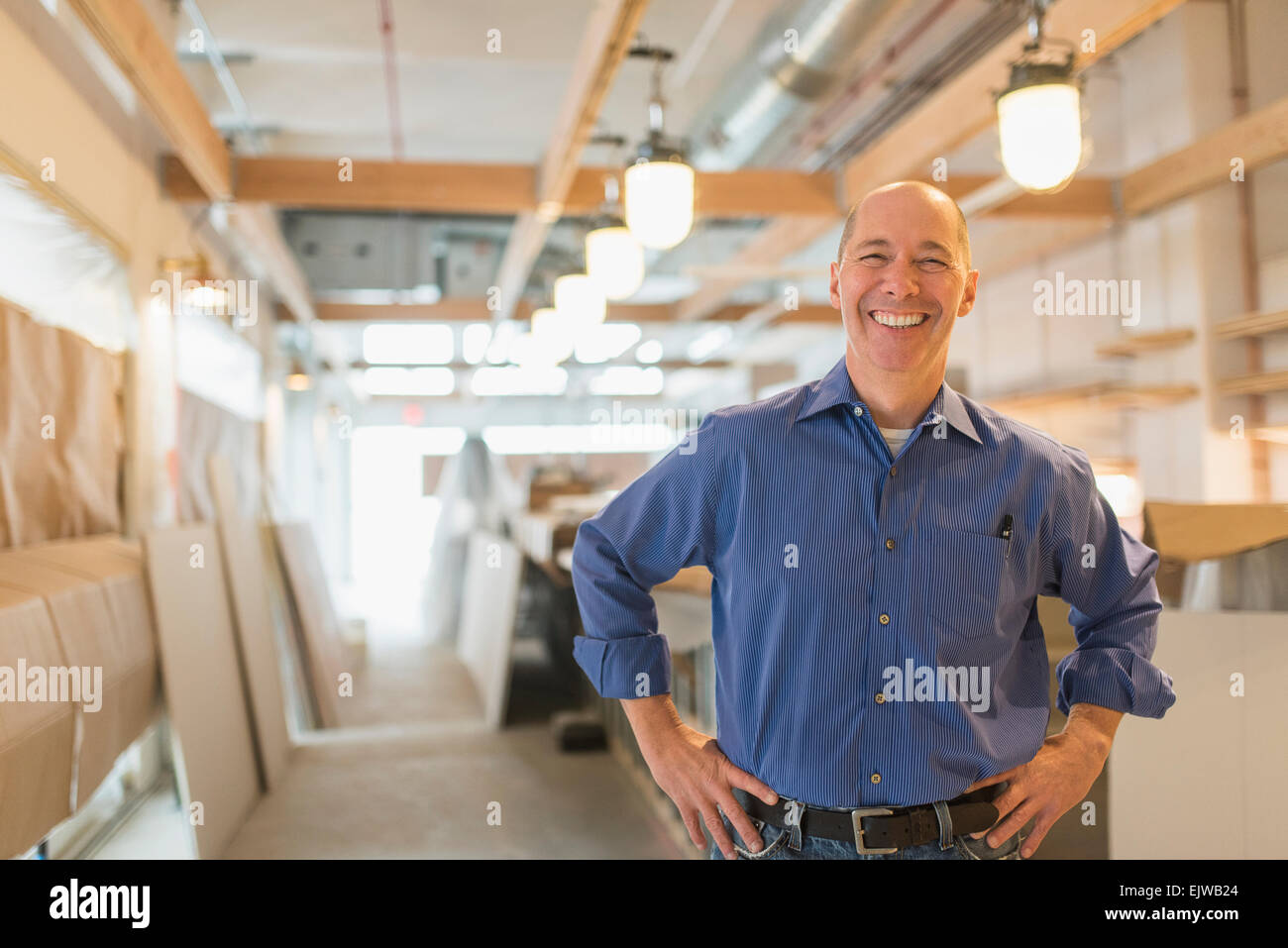 Portrait of smiling business owner Stock Photo