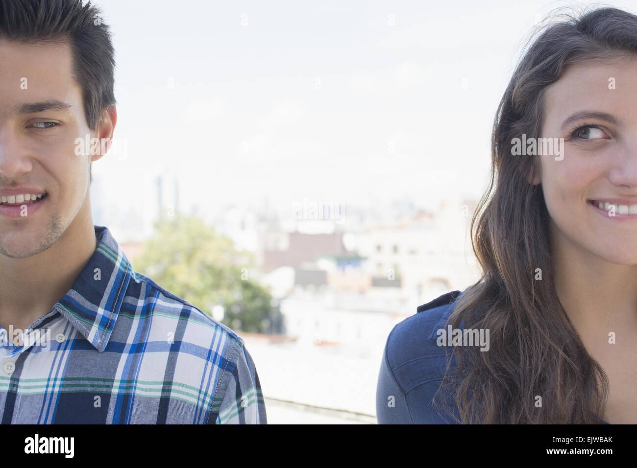 USA, New York State, New York City, Brooklyn, Young couple looking sideways Stock Photo