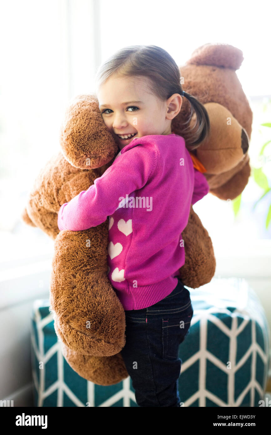 Child with teddy bear hi-res stock photography and images - Alamy