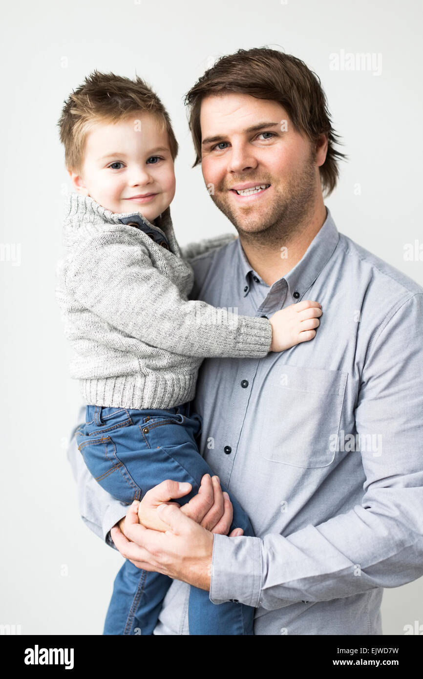 Father three children bond hi-res stock photography and images - Alamy