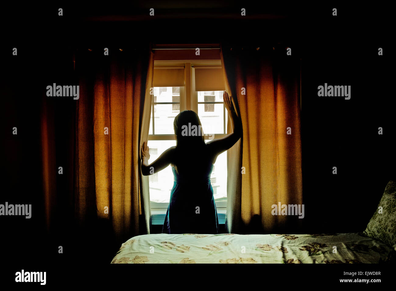 Female rear view backlit hi-res stock photography and images - Alamy