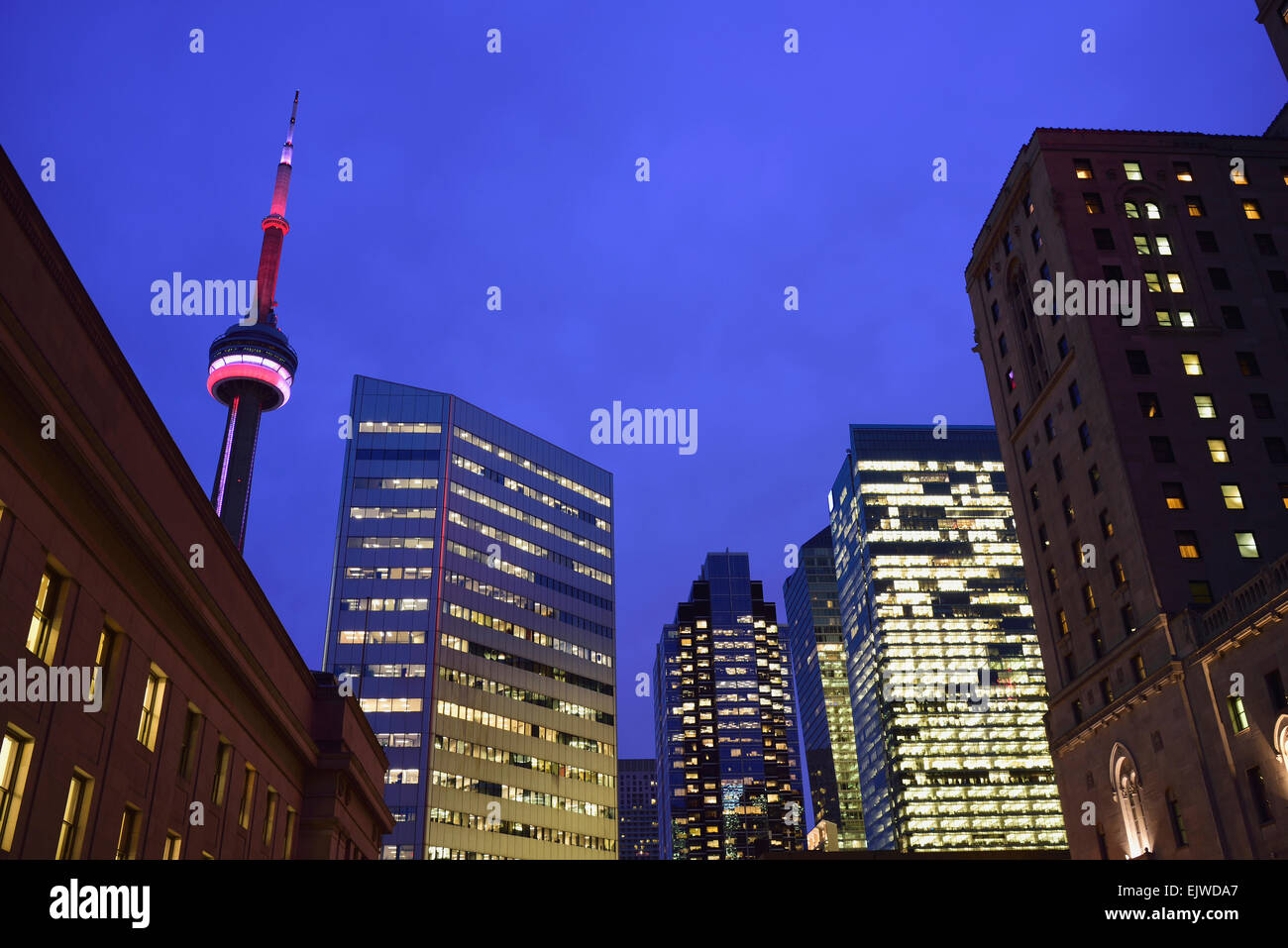 Canada, Toronto, Illuminated city at dusk and CN Tower Stock Photo - Alamy