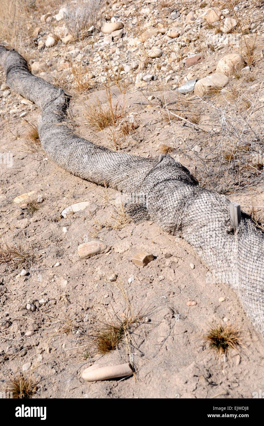 Soil Erosion Prevention Technology using straw wattle and mesh Stock