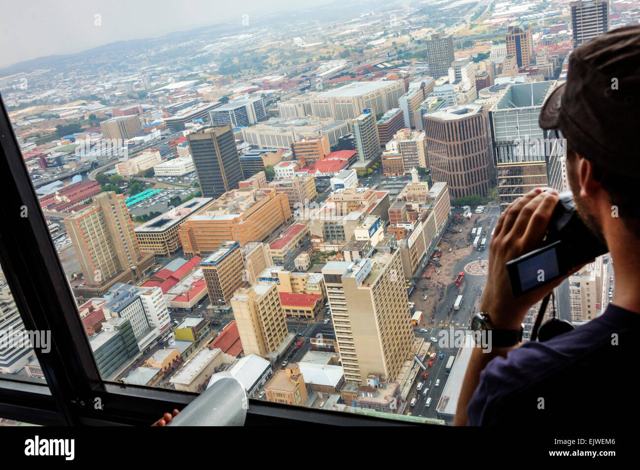 Johannesburg South Africa,Carlton Centre,center,Top of Africa,observatory deck,view from,man men male,looking,buildings,city,SAfri150306128 Stock Photo