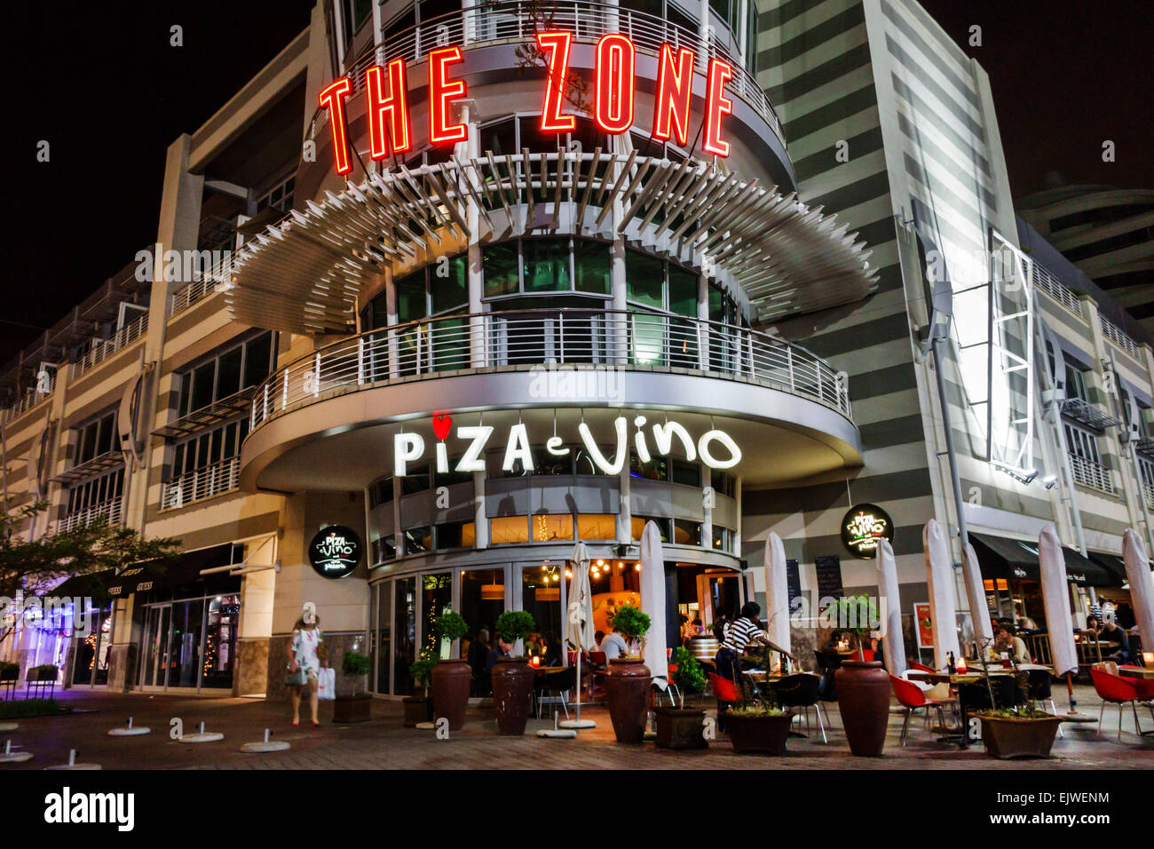 Johannesburg South Africa,Rosebank,The Zone Mall,Piza e Vino,restaurant restaurants food dining cafe cafes,front,entrance,night evening,SAfri150306153 Stock Photo