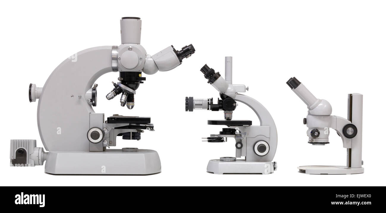 Vintage Microscope family (isolated), Basic, medium and advanced model side by side Stock Photo
