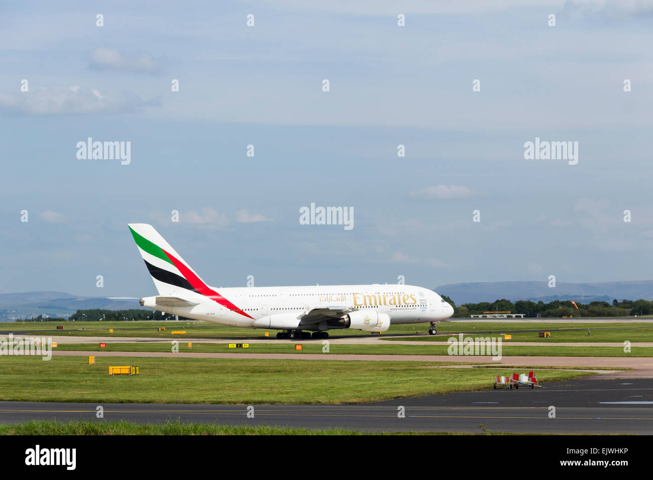 Emirates Airbus A380  aircraft taxiing towards the take-off runway at Manchester airport for  the flight to Dubai. Stock Photo