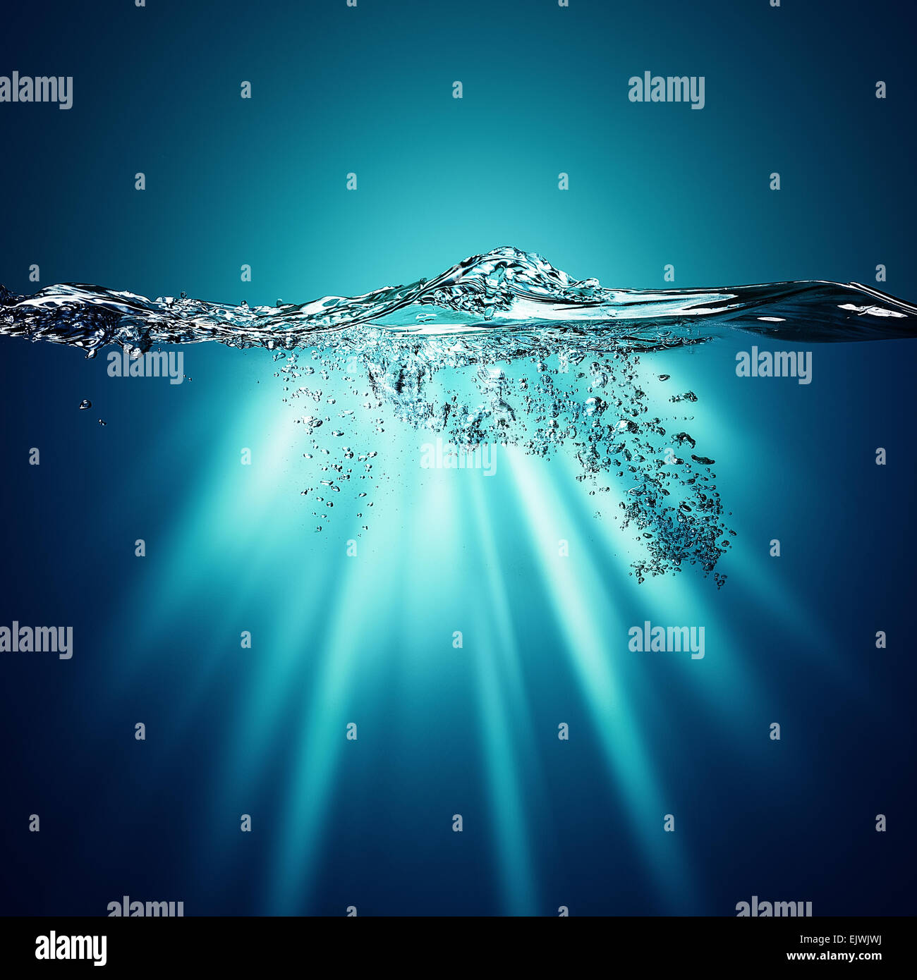 Abstract underwater backgrounds with sun beam and water ripple Stock Photo