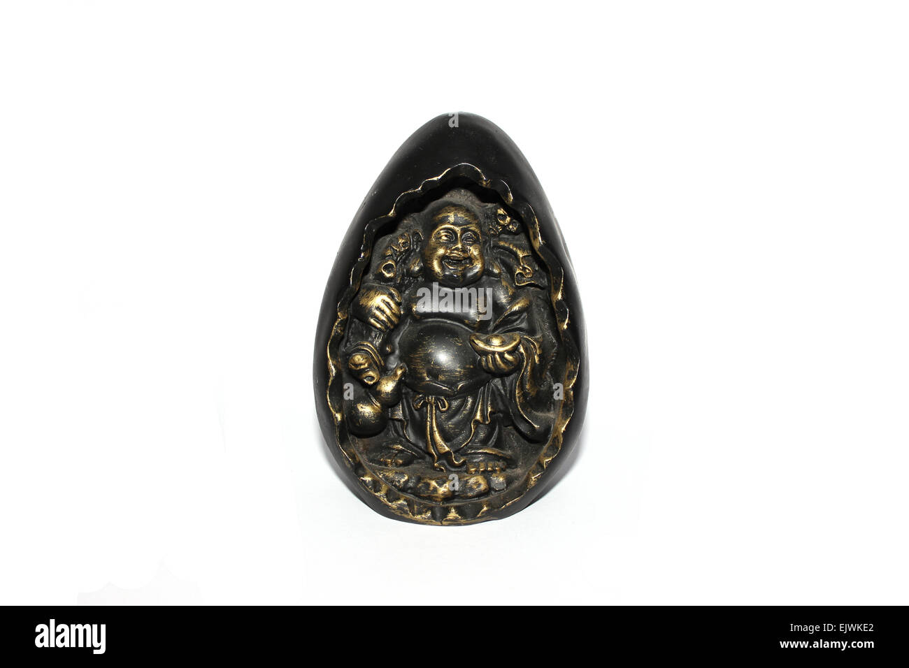 Statue of Budai, Laughing Buddha, sitting inside egg. Stock Photo