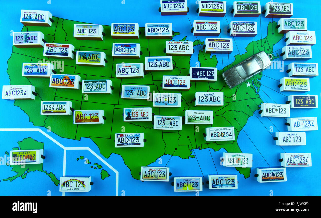 New Cumberland, PA, USA - April 1, 2015 : Map of the US with state license plates and a model car Stock Photo