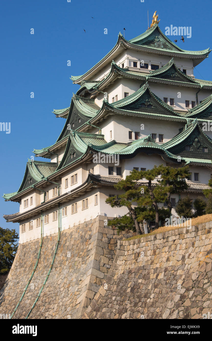 Nagoya Castle on a sunny day with crows circling near the top. Stock Photo