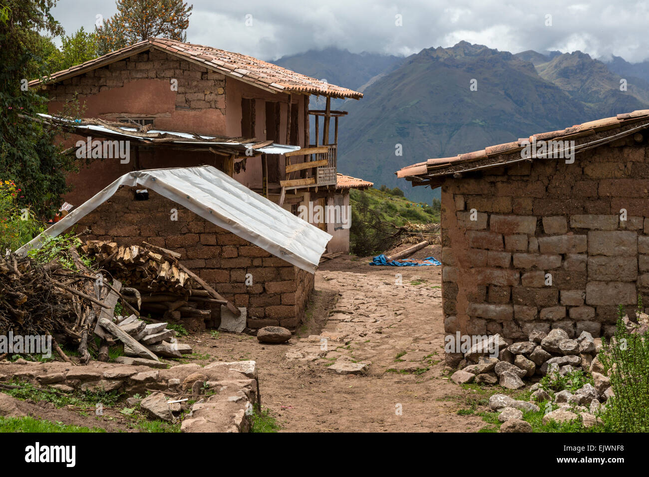 Peru, Urubamba Valley, Quechua Village of Misminay.  House under Construction, Adding a Second Story. Stock Photo