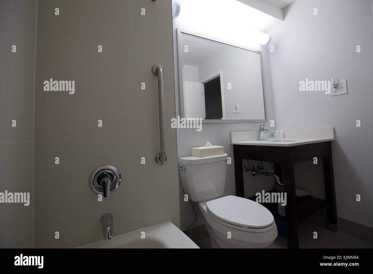 hotel bathroom interior bathtub toilet sink Stock Photo
