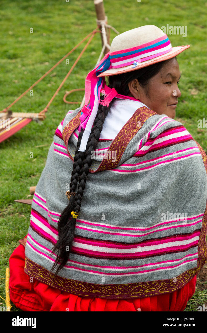 Peru, Urubamba Valley, Quechua Village of Misminay.  Quechua Woman with Pigtails. Stock Photo