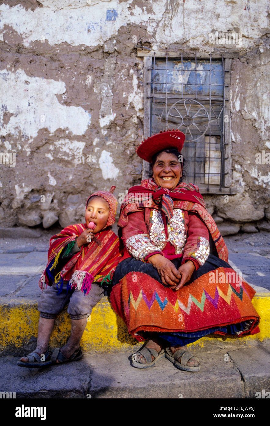 Peru, Ollantaytambo.  Quechua Grandmother and her Grandson. Stock Photo