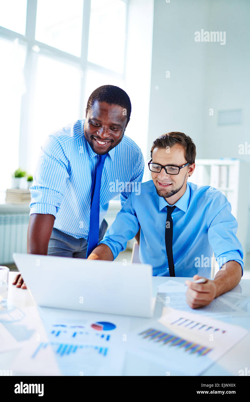 Confident employees hi-res stock photography and images - Alamy
