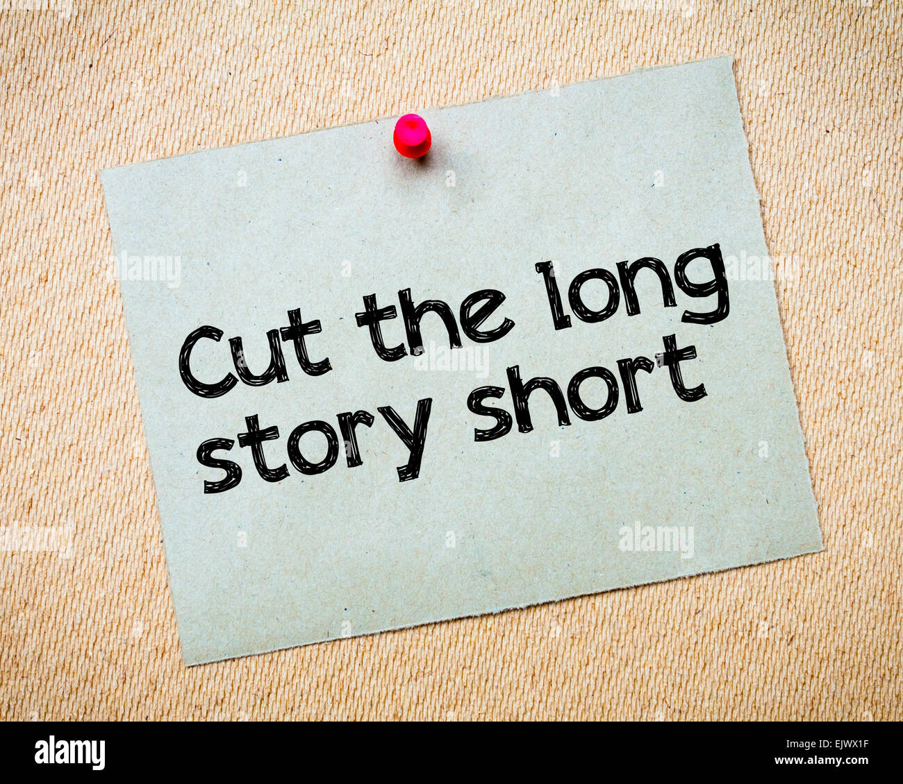 Cut the long story short Message. Recycled paper note pinned on cork board. Concept Image Stock Photo